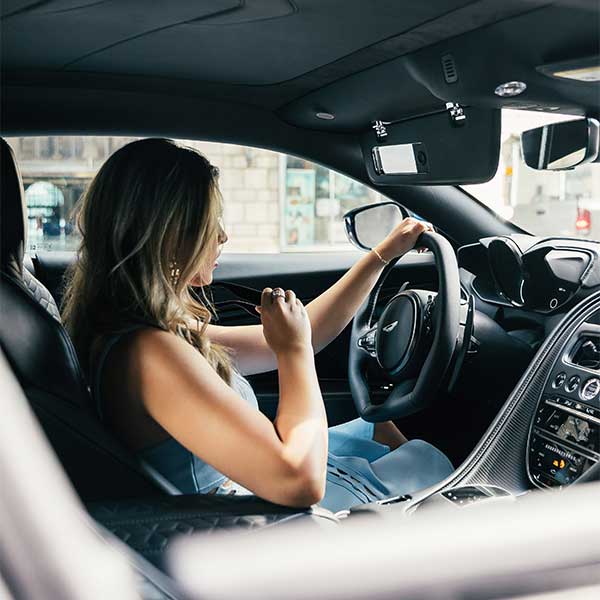 Driving instructor coaching a learner